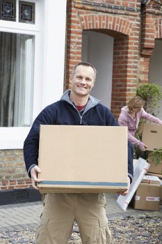 Moving team applying health and safety procedures during a removals job