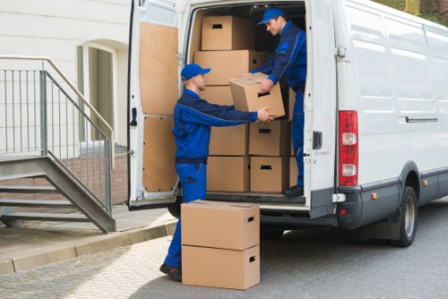 Moving van and packed boxes for a local Acton removals quote