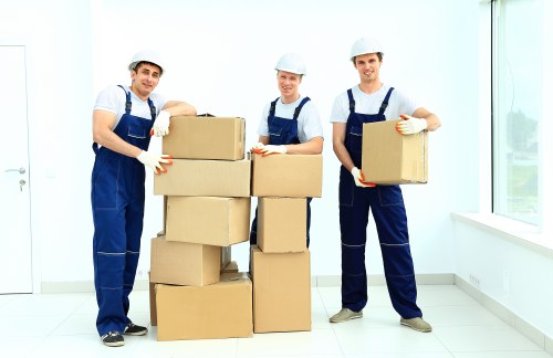 Commercial movers transporting office equipment in Acton