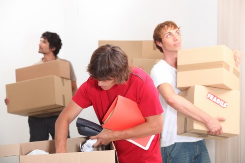 Packed household boxes ready for a local Acton move