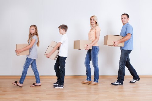 Acton house moving team assisting with household furniture transport