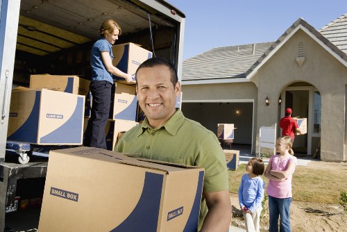 Local team organising household items for packing in Acton